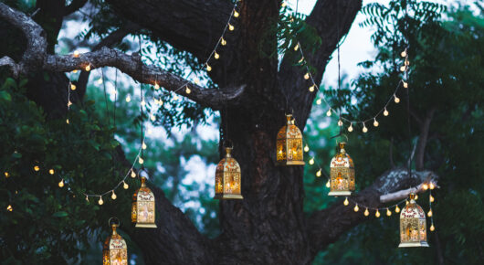 Night wedding ceremony with lot of candles and vintage lamps