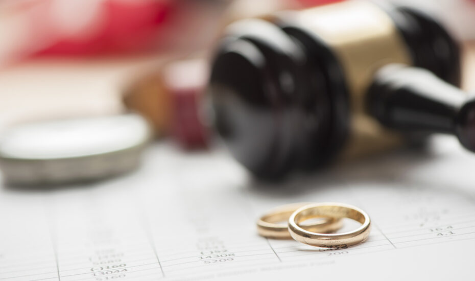 Gavel and wedding rings