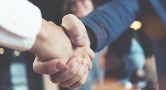 Business people shaking hands